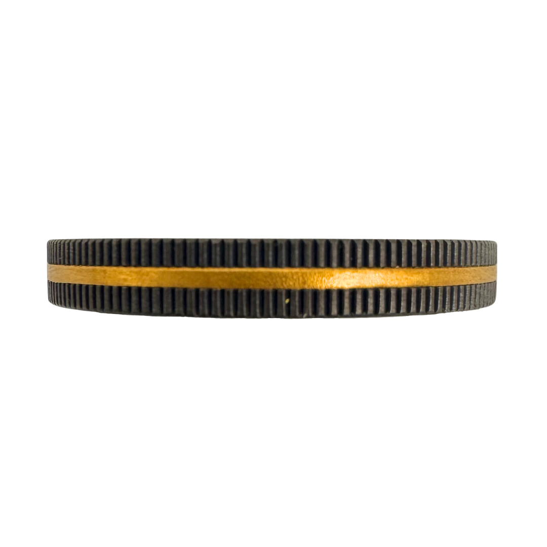 Titanium ring with fine knurling and a pure gold inlay