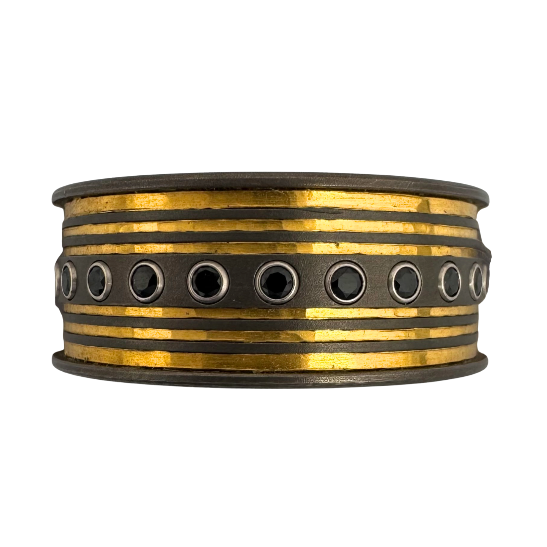 Titanium and 24K gold band set with (24)1.5mm black spinel in gold settings