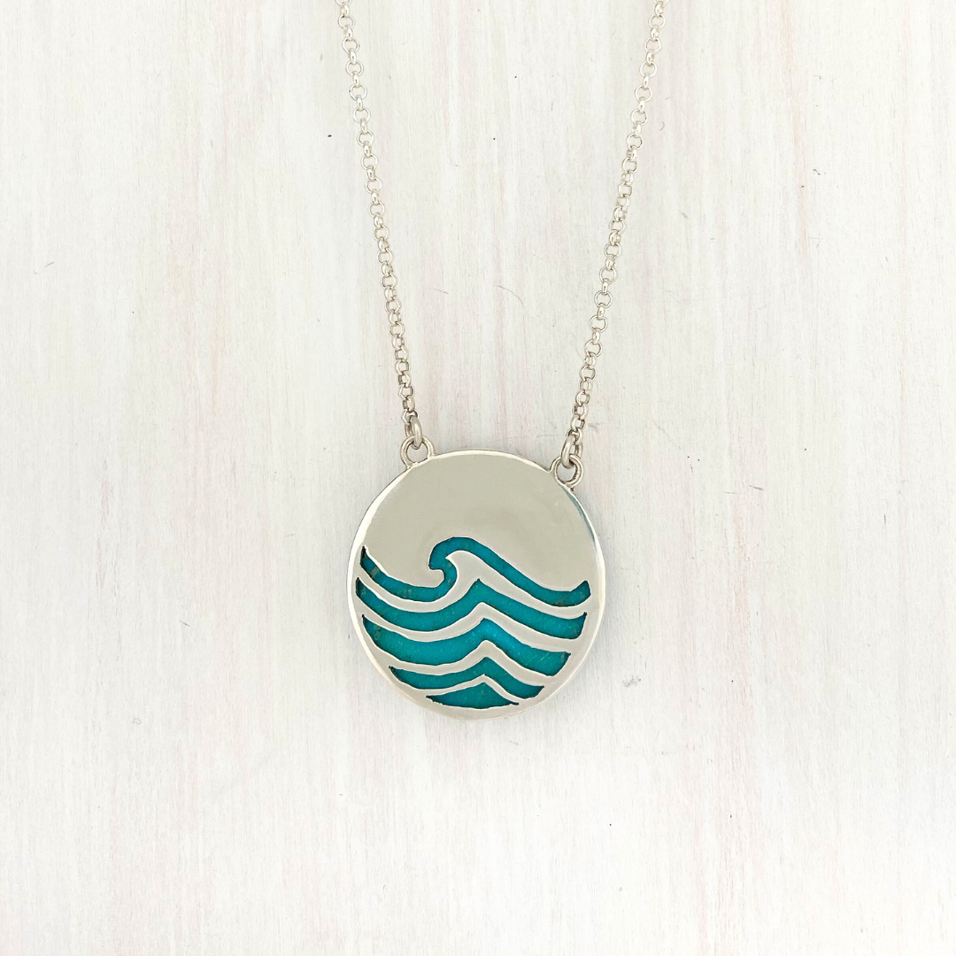 Round Opalized Wood Pendant with a Wave on the back