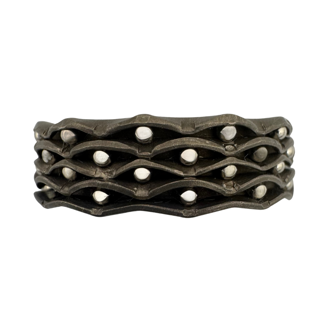 Titanium 4-channel band with punch-work and stainless steel balls