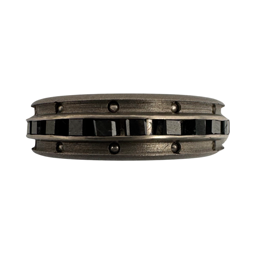Titanium 3-channel band with black diamond cubes in center channel and stainless balls in outside channels