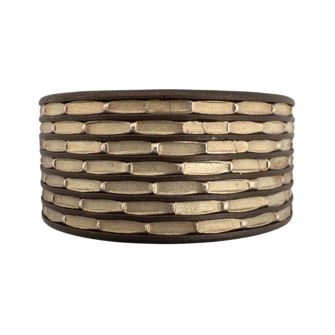 Titanium (7)channel ring, inlaid with pure silver with punch work pattern