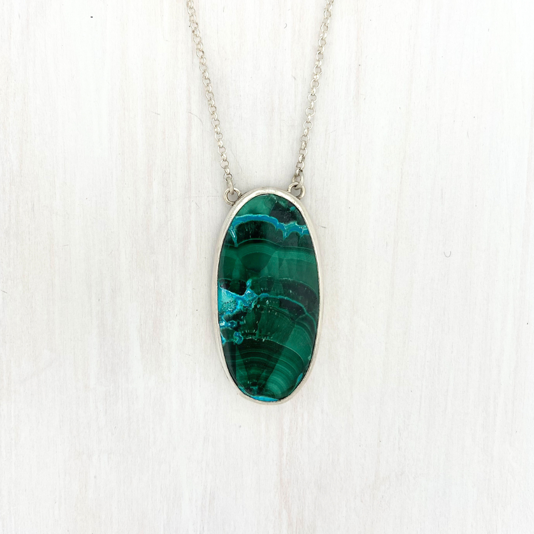 Oval Azurite Malachite Pendant with a Leaf on the Back