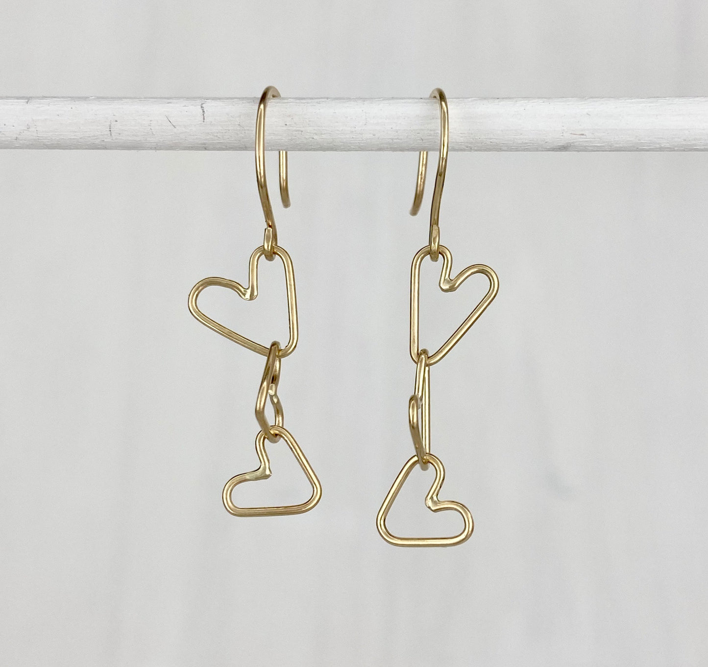 14k Gold Connected Hearts Dangle Earrings