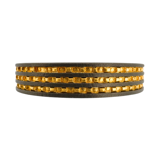 Titanium, with (3) 24K gold inlays
