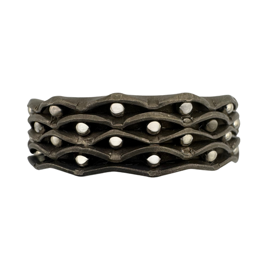 Titanium 4-channel band with punch-work and stainless steel balls