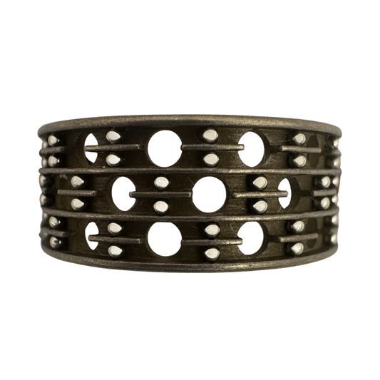 Titanium 6-channel ring with perforations and stainless steel balls