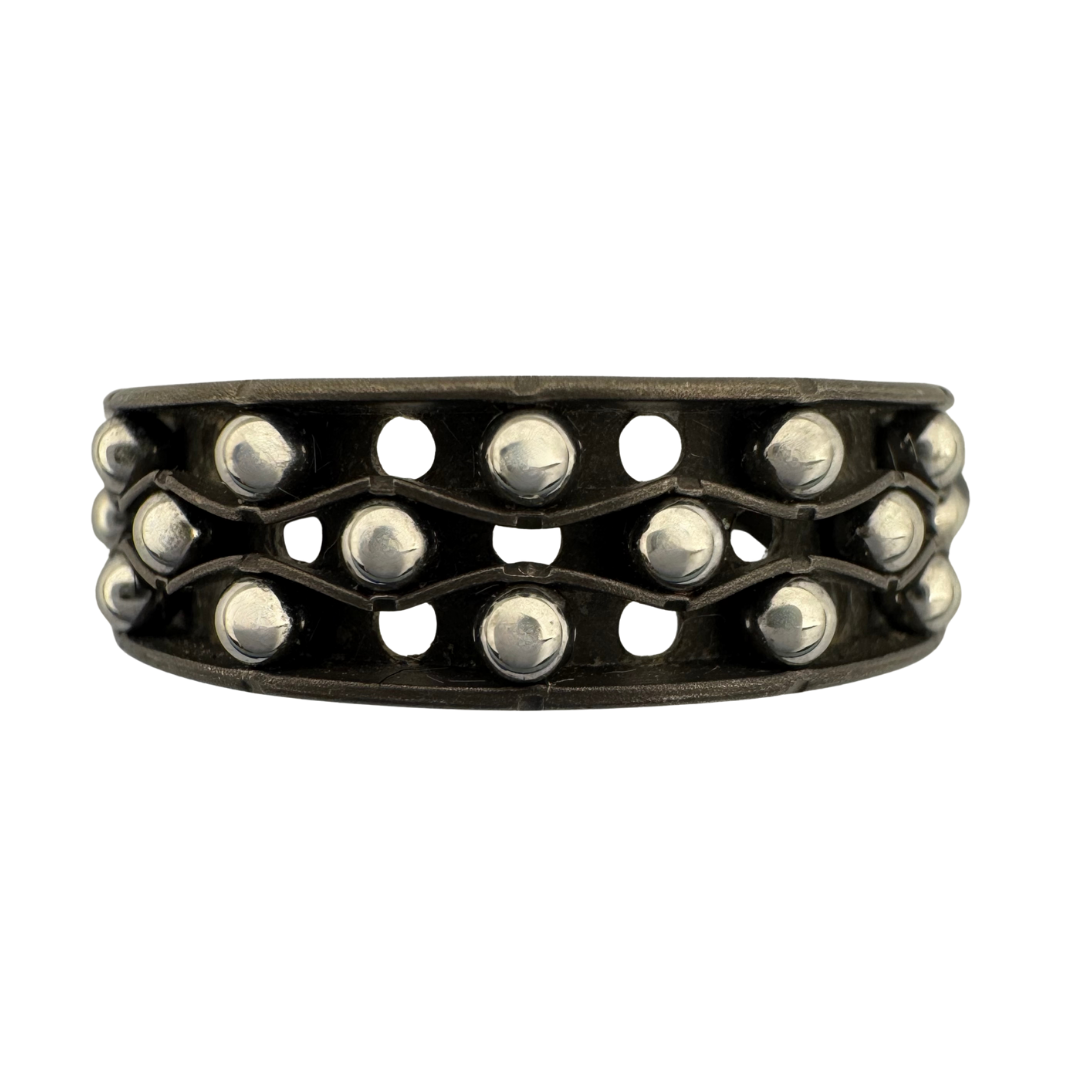 Titanium 3-channel perforated band, punch-worked with 2mm stainless steel balls