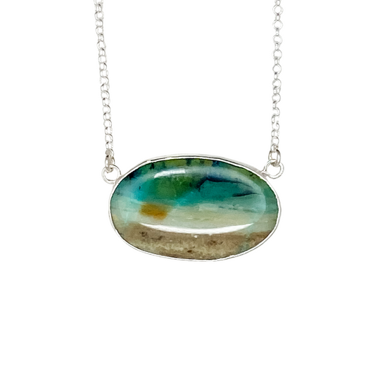 Oval Opalized Wood Pendant with Sun