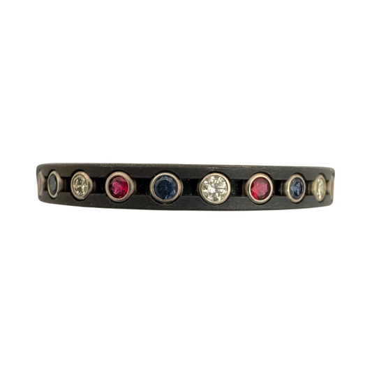 Titanium band with alternating 1.5mm diamonds, rubies and sapphires
