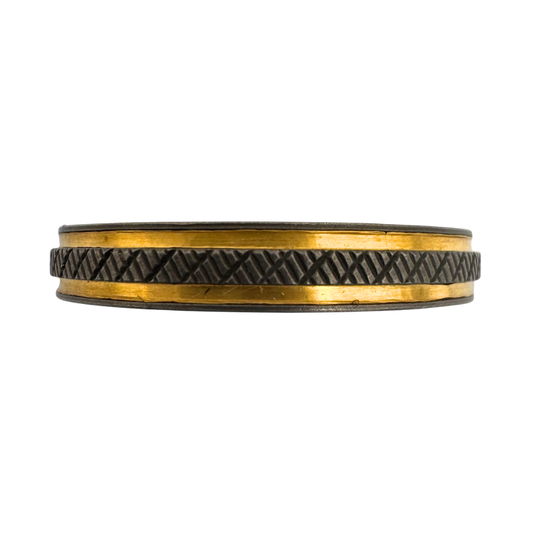Titanium knurl patterned band with outside channels inlaid with 24K gold