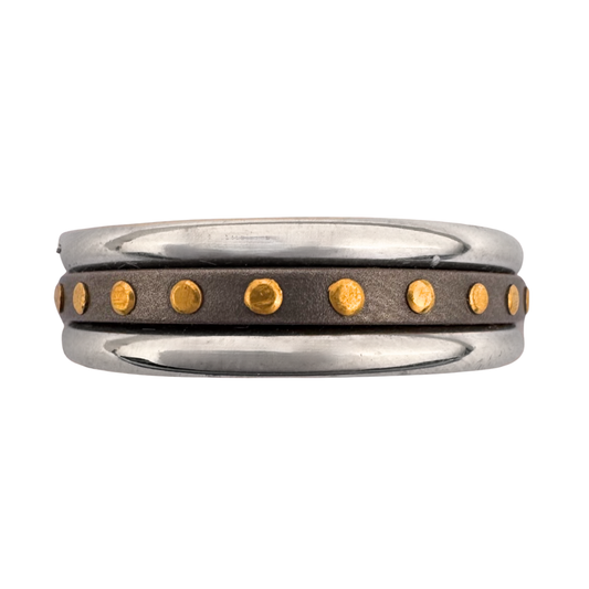 Two 2mm 14K gold bands with titanium and 24K gold rivets