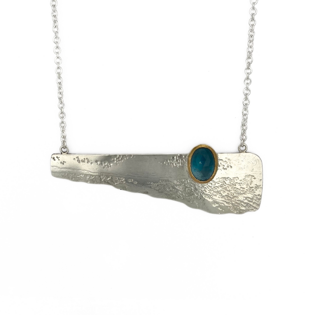 Silver Landscape Necklace with London Blue Topaz set in 18kt Gold