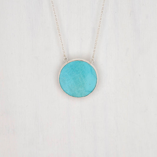 Round Turquoise Pendant with a Wave