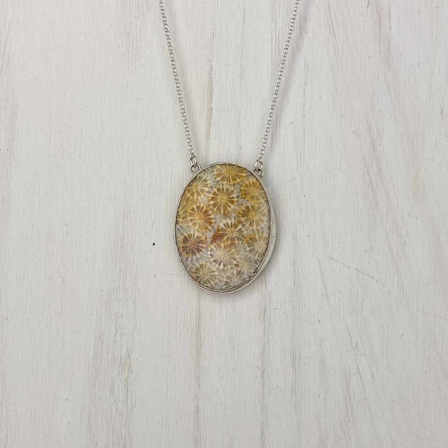 Fossilized Coral Pendant with Flowers