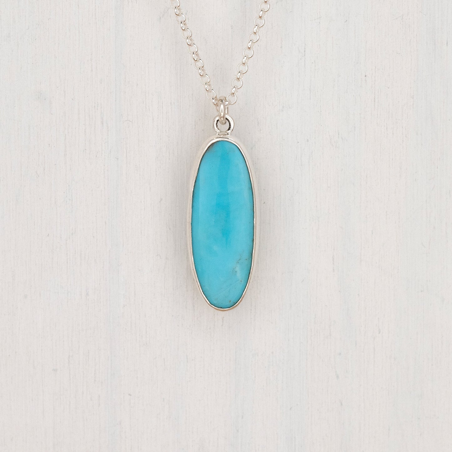 Oval Turquoise Pendant with Feather